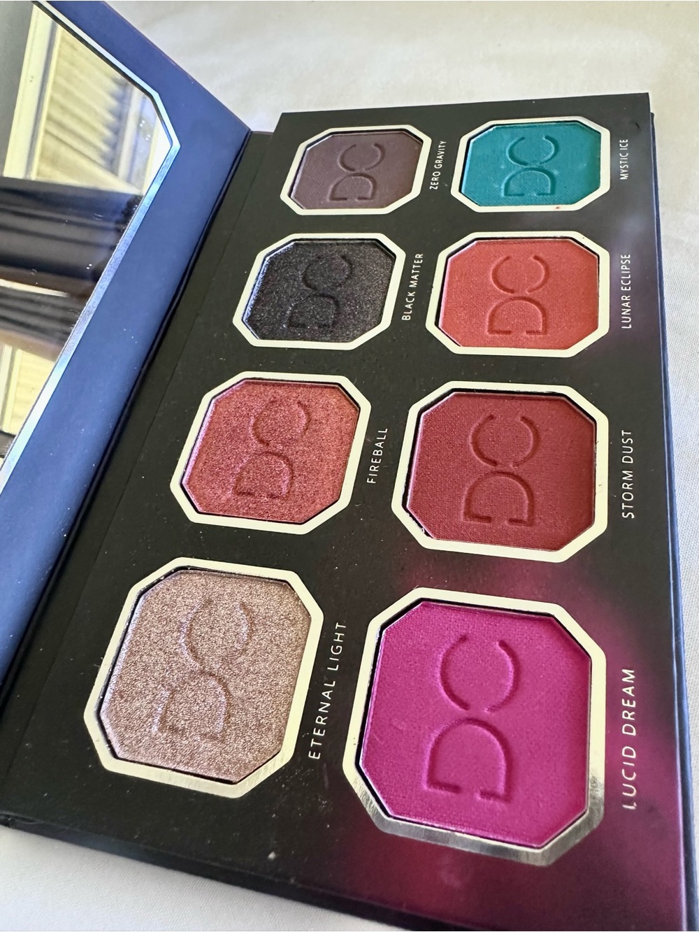 DC Women Eyeshadow Palette — Teal, Pink, Red, Purple, Bronze, Black, Champagne